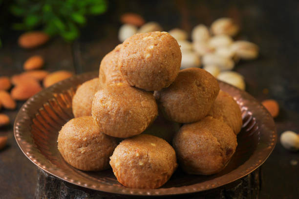 Panjeeri laddu is a delicious and nutritious Indian sweet, traditionally made with whole wheat flour, ghee, dry fruits, and spices.
