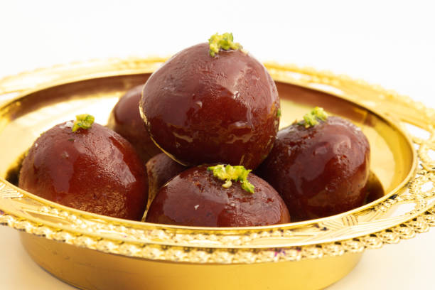 Kala Jamun Also Called Dark Gulab Jamun Is Milk Solids Based Mithai Made of Mashed Khoya Grated Paneer Elaichi Khoa Panir In Cheeni Ki Chasni. Food Theme For Holi, Deepawali, Rakshabandhan, Dussehra